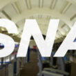 Inside the terminal at John Wayne airport in Orange County with its iconic curved roof.